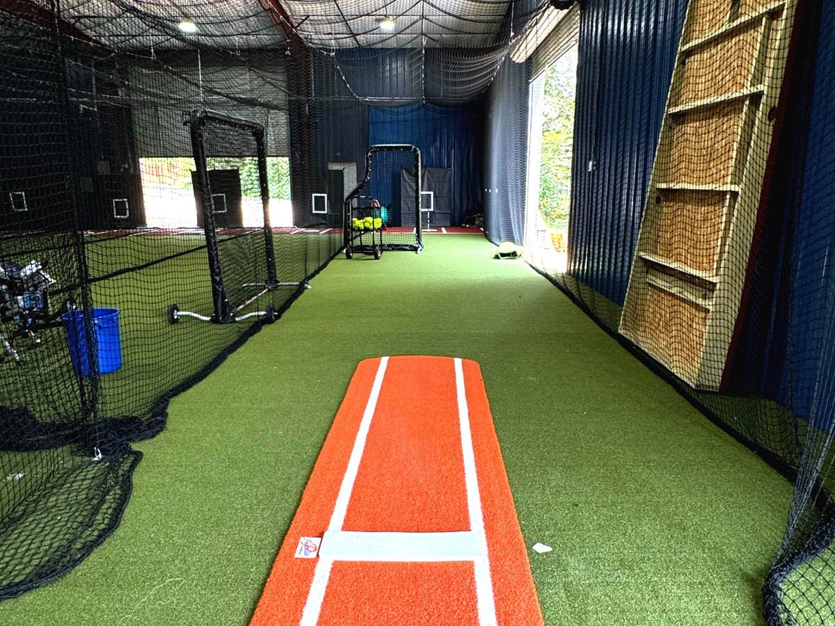 Strike Zone pitching lane with orange mat and targets